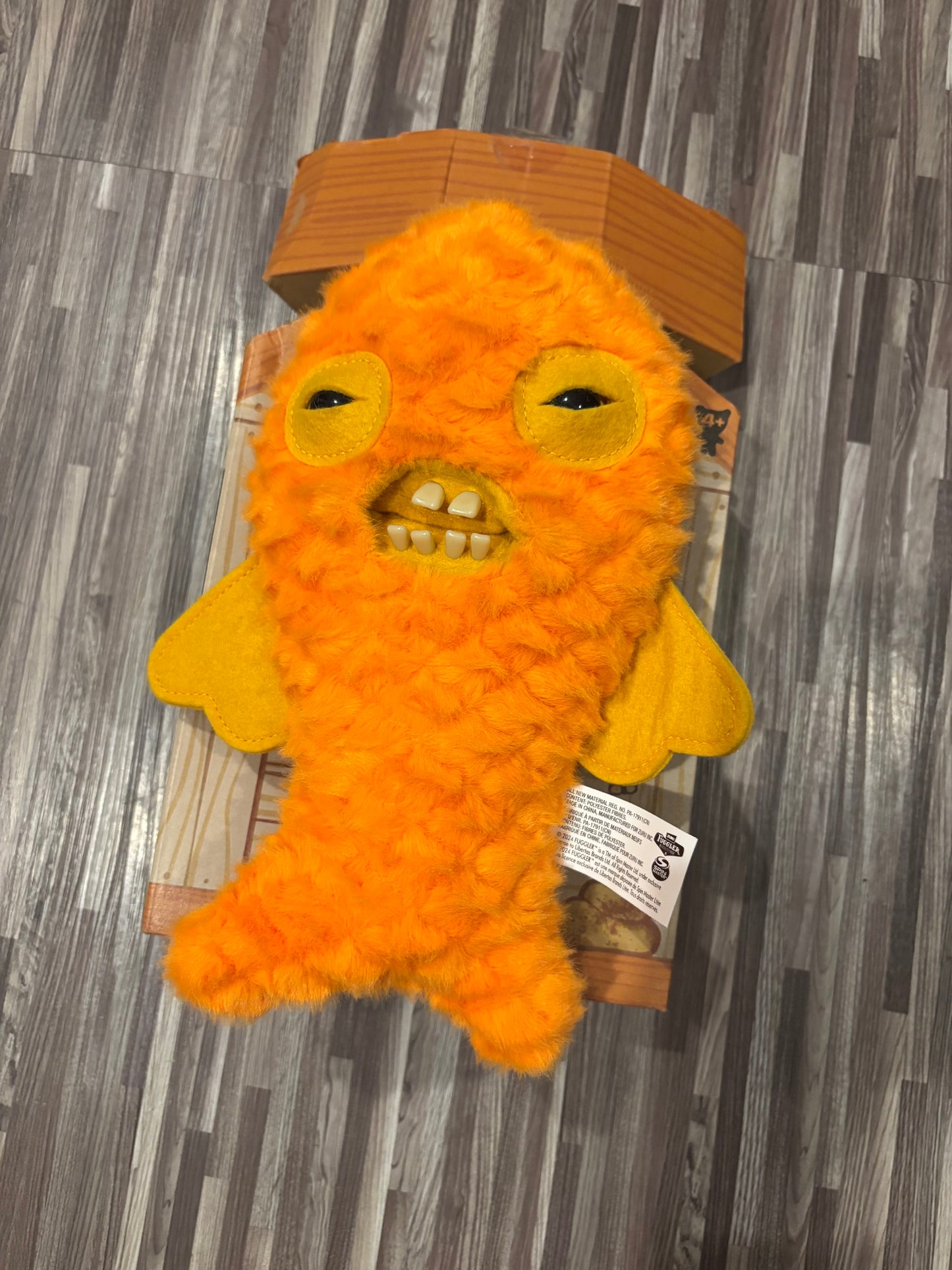 FUGGLER X BUTT UGLY PETS “GOLDEN FISH”